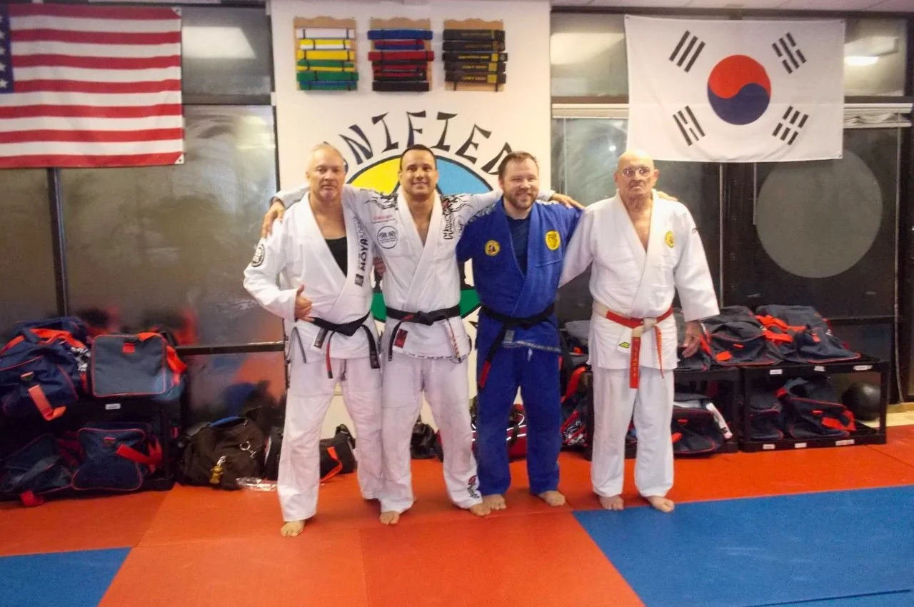 Adults enjoying a fat-burning martial arts workout